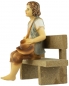 Mobile Preview: Handbemalte Krippenfigur Junge sitzend inkl. Bank, ca. 9 cm, K 001-28